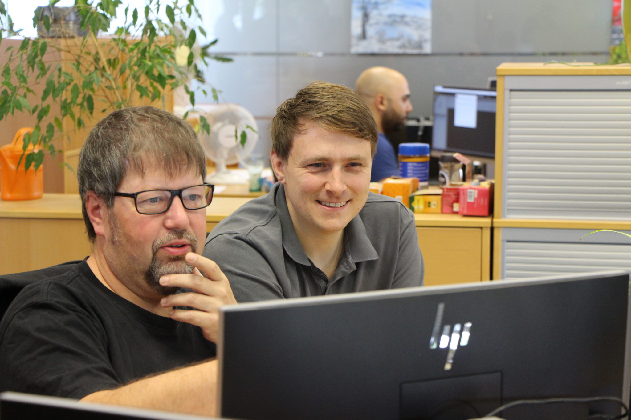 Reviewing an application together at a screen